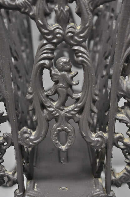 Vintage French Renaissance Victorian Style Cast Iron Magazine Rack with Cherubs