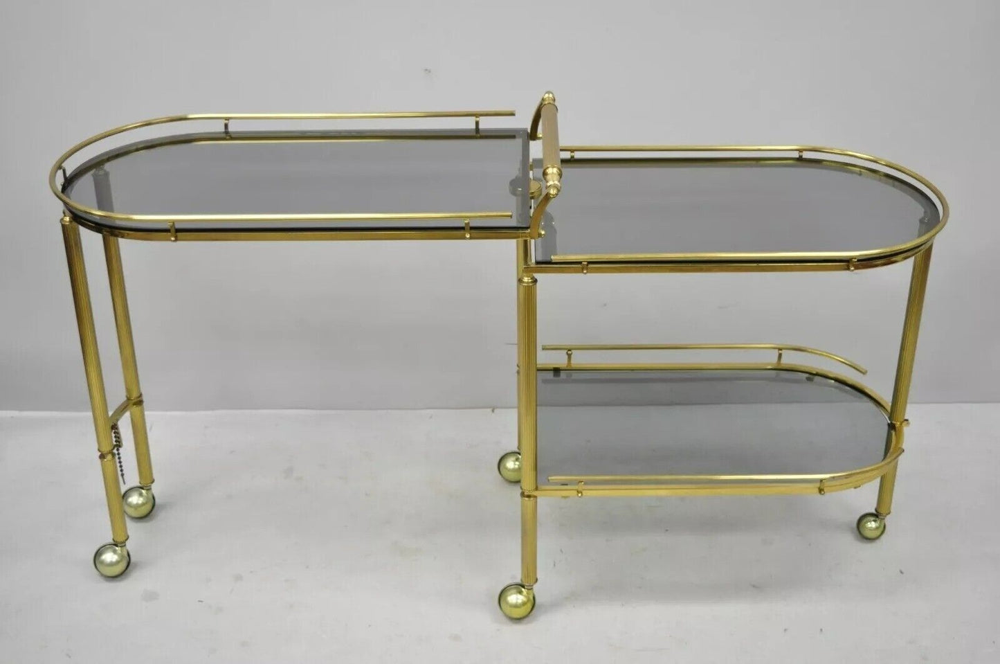 Italian Hollywood Regency Brass Swivel Rolling Bar Cart Server with Smoked Glass