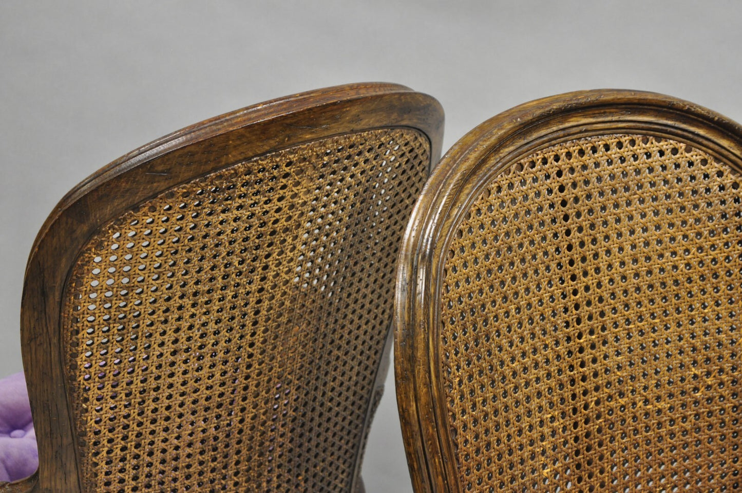 Vintage French Louis XVI Style Cane Balloon Back Walnut Arm Chairs - a Pair