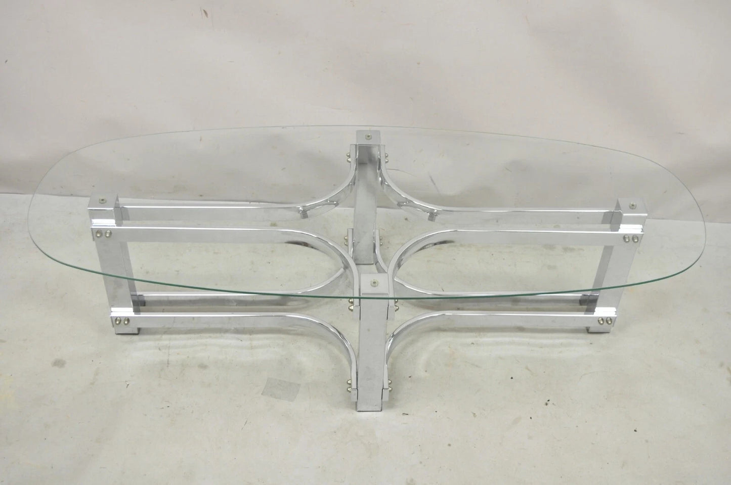 Vintage Mid Century Modern Oval Glass Top Sculptural Chrome Frame Coffee Table