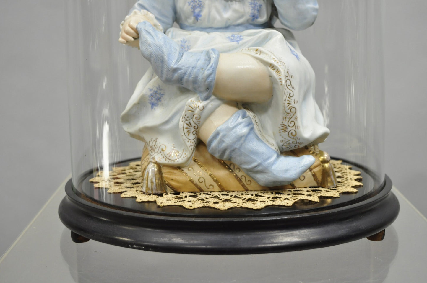 Antique Bisque Porcelain Seated Baby Figurine in Circular Glass Display Cloche