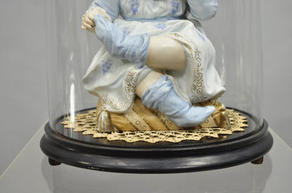Antique Bisque Porcelain Seated Baby Figurine in Circular Glass Display Cloche