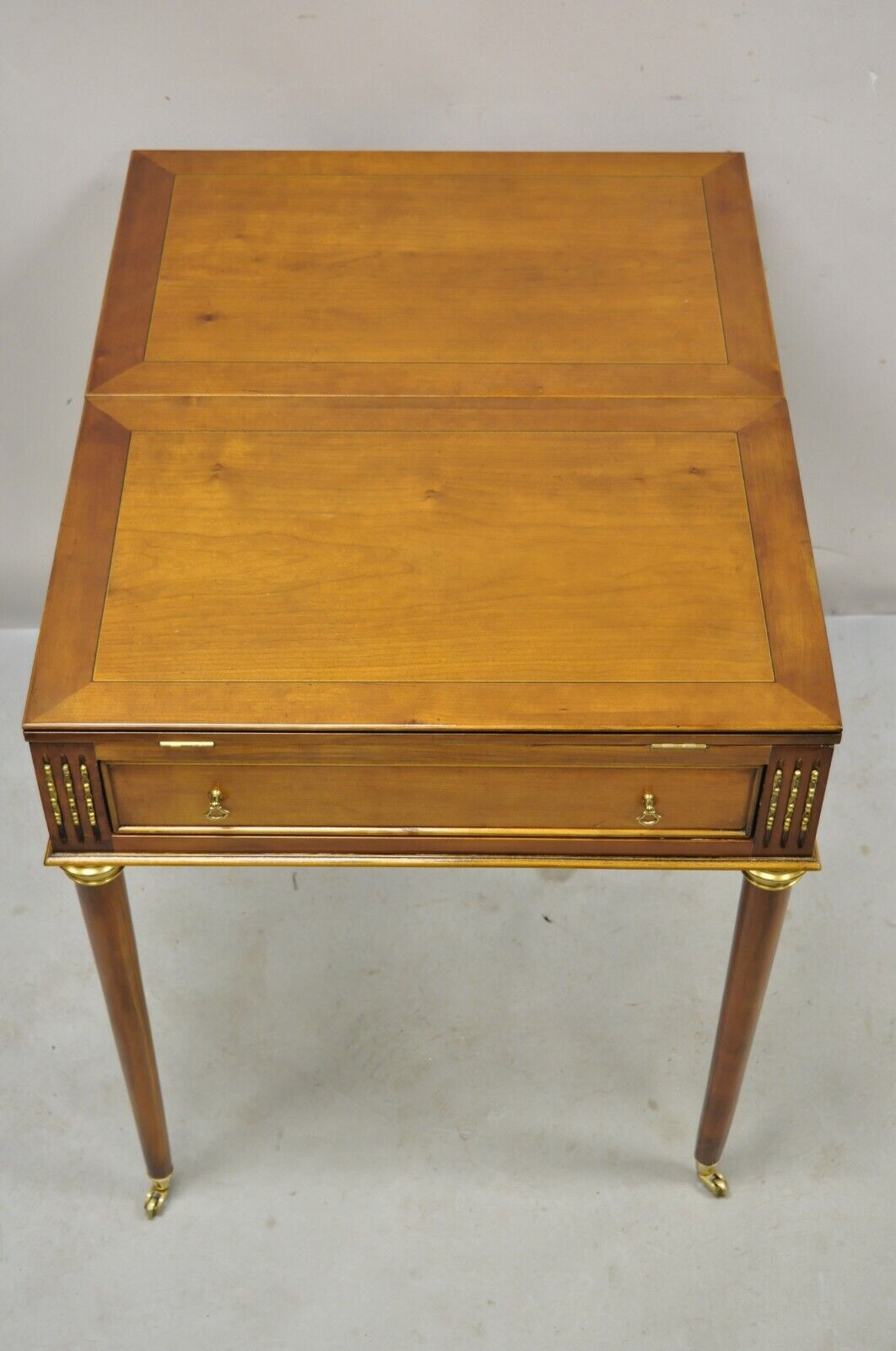 French Louis XVI Style Cherry Wood Flip Top Game Table With Brass Wheels