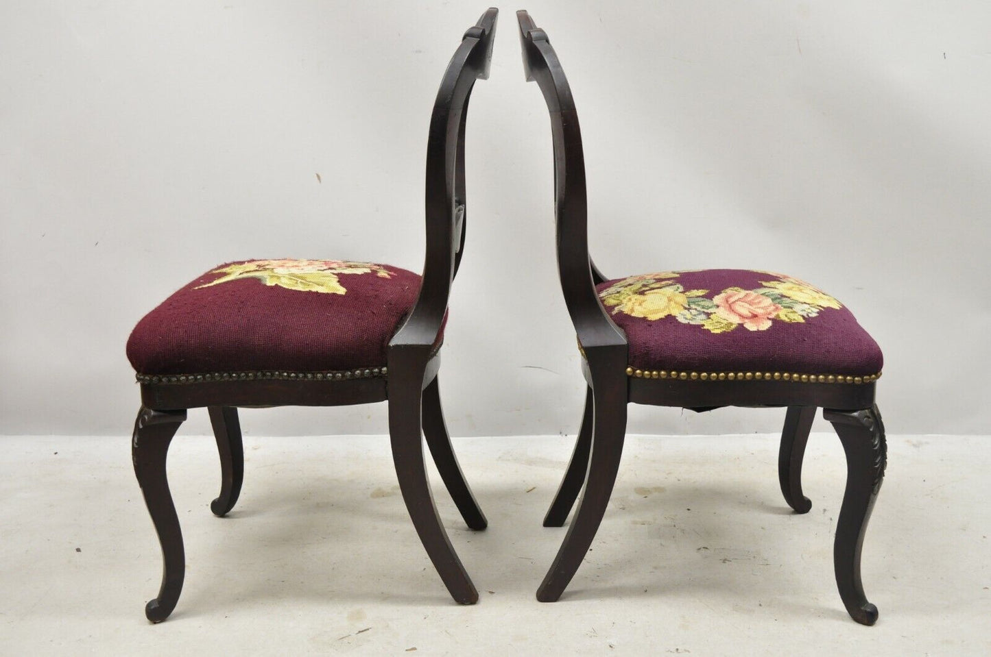 American Eastlake Victorian Carved Mahogany Needlepoint Side Chairs - a Pair