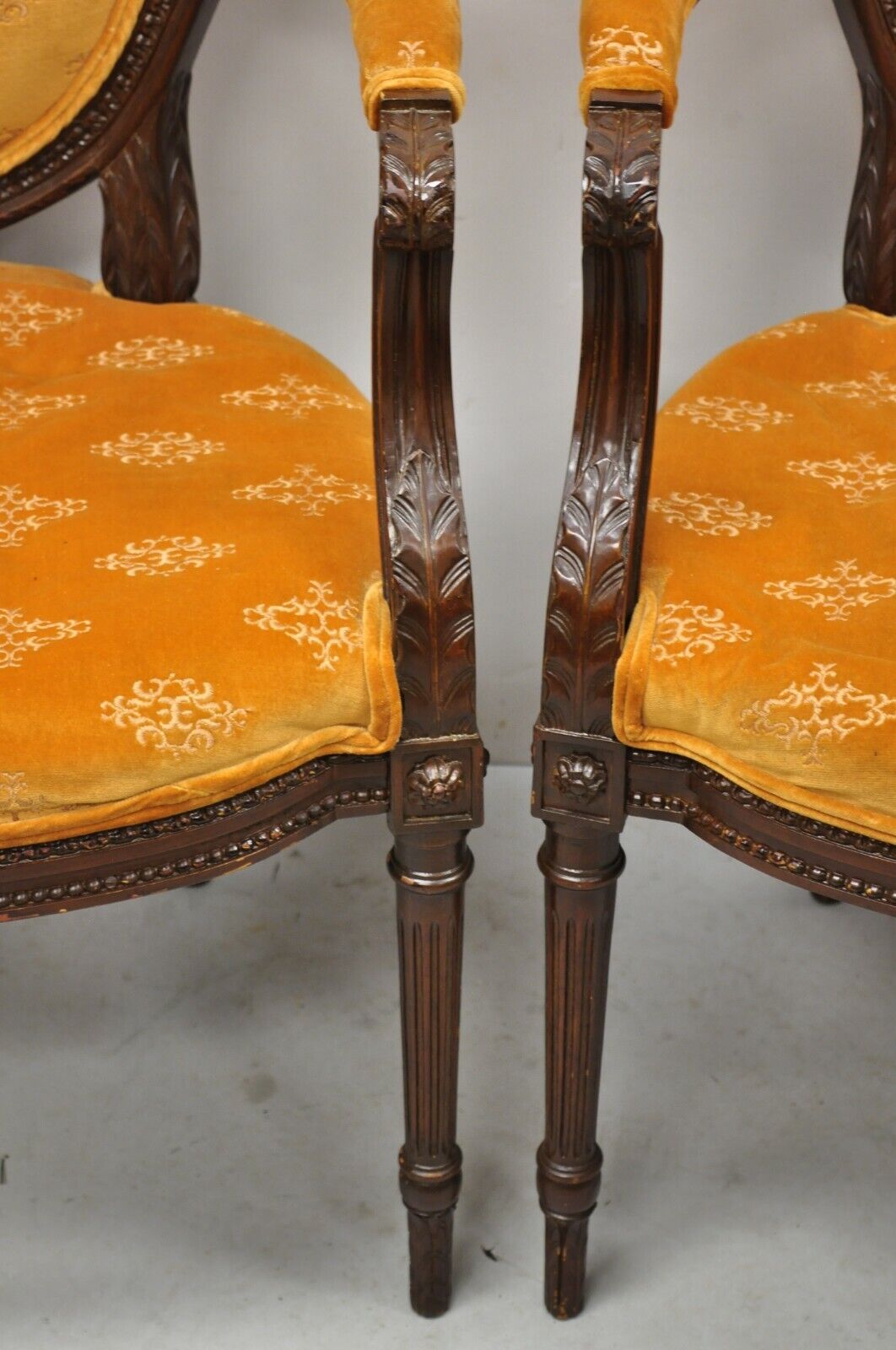 French Louis XVI Style Upholstered Oval Back Dining Arm Chairs - a Pair