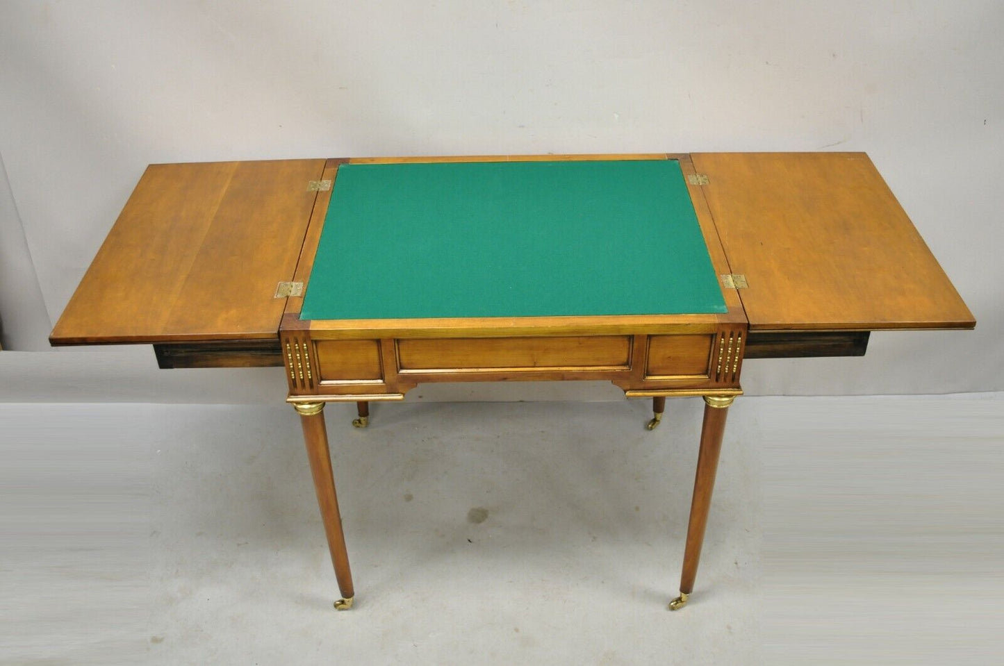 French Louis XVI Style Cherry Wood Flip Top Game Table With Brass Wheels