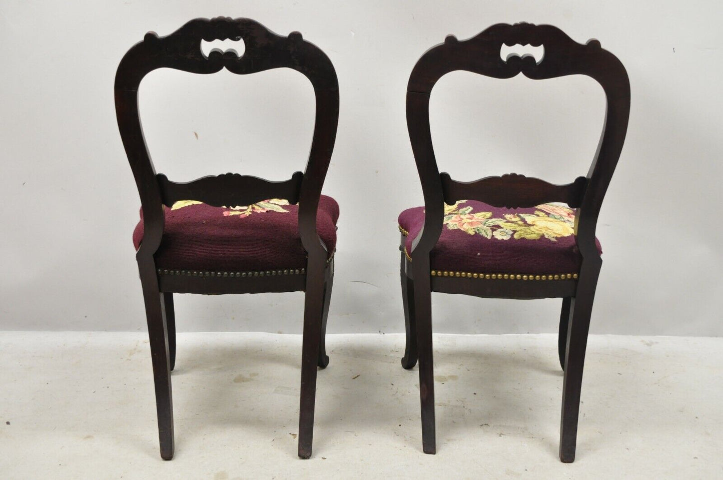 American Eastlake Victorian Carved Mahogany Needlepoint Side Chairs - a Pair